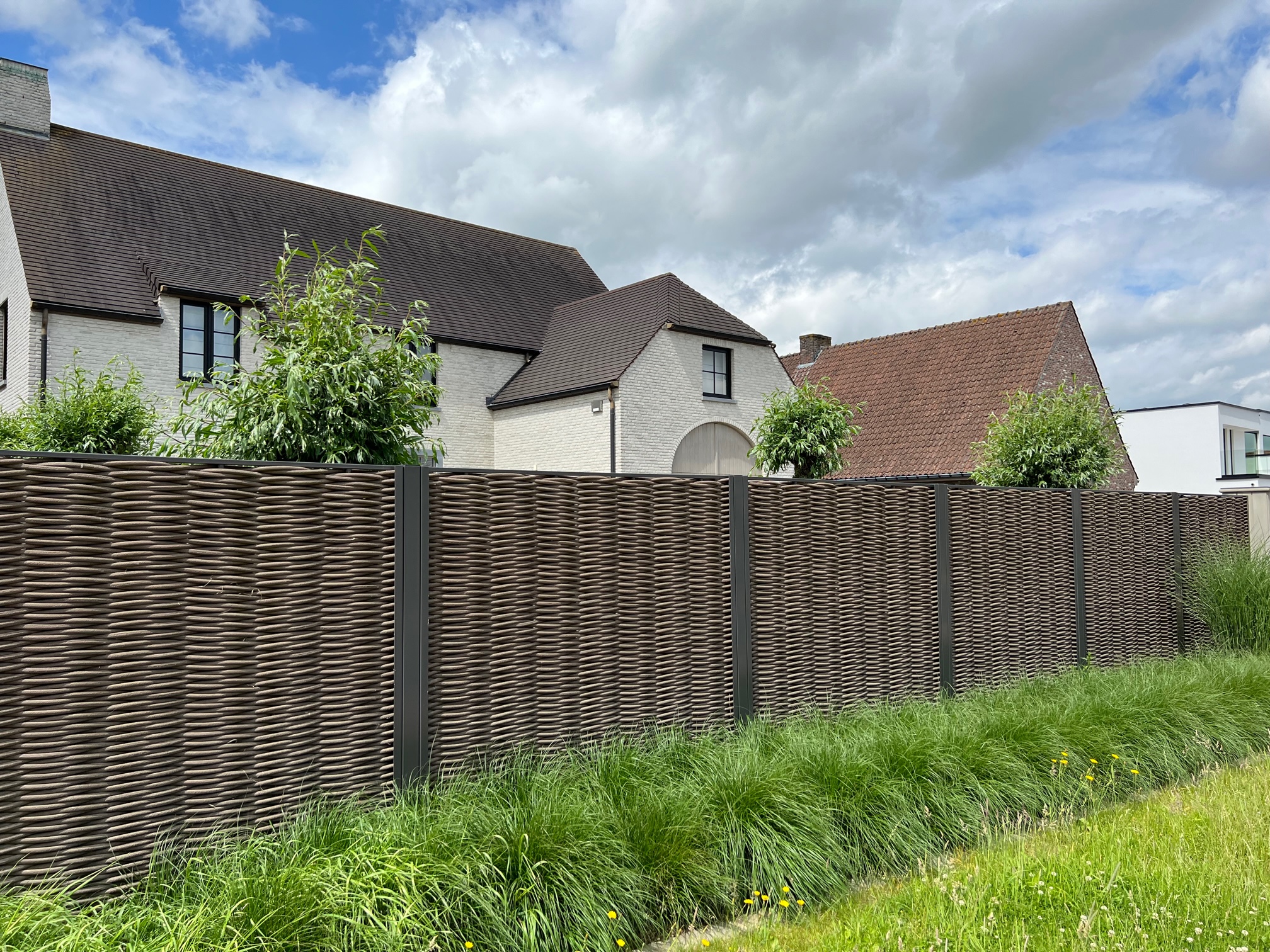 Clôture de jardin double tressage en Suisse romande